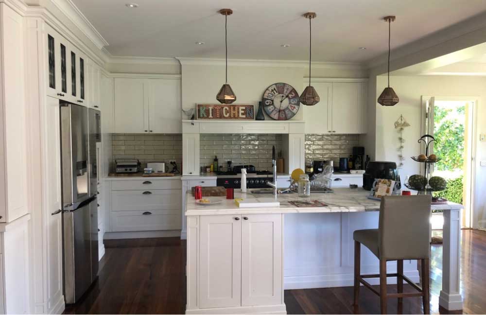 Seller;s agent kitchen before selling